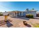 Relaxing backyard with patio cover and fire pit at 1161 S Grand Dr, Apache Junction, AZ 85120