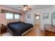 Main bedroom with a king-size bed and built-in dresser at 1161 S Grand Dr, Apache Junction, AZ 85120