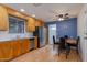 Kitchen with wood cabinets, stainless steel appliances, and breakfast nook at 1161 S Grand Dr, Apache Junction, AZ 85120