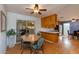 Eat-in kitchen with wood cabinets and stainless steel appliances at 1161 S Grand Dr, Apache Junction, AZ 85120