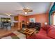 Bright living room featuring a fireplace and comfortable seating at 1161 S Grand Dr, Apache Junction, AZ 85120