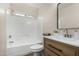 Clean bathroom with a shower/tub combo, vanity, and toilet at 12618 W Columbine Dr, El Mirage, AZ 85335