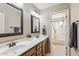 Double vanity bathroom with shower and tub at 1320 W Muirwood Dr, Phoenix, AZ 85045