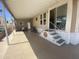 Covered patio with seating, bikes and access to the home at 1398 S Cheyenne Dr, Apache Junction, AZ 85119