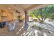 Outdoor kitchen and patio with stone accents at 2181 E La Vieve Ln, Tempe, AZ 85284