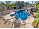 Relaxing pool and spa with rock waterfall feature at 2181 E La Vieve Ln, Tempe, AZ 85284