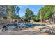 Resort-style pool with a rock waterfall feature and spacious patio at 2181 E La Vieve Ln, Tempe, AZ 85284