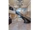 Elegant curved staircase with wrought iron railings at 2181 E La Vieve Ln, Tempe, AZ 85284