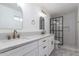 Modern bathroom with double vanity and walk-in shower at 2202 W Berridge Ln, Phoenix, AZ 85015