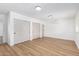 Bright bedroom with double closets and wood-look floors at 2202 W Berridge Ln, Phoenix, AZ 85015