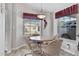 Bright kitchen nook with a table and chairs, offering a cozy dining area at 3301 S Goldfield Rd # 2034, Apache Junction, AZ 85119