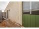 Small backyard space with patio and partial privacy wall at 524 S Allred Dr, Tempe, AZ 85288