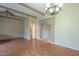 Open living area with hardwood floors and access to other rooms at 524 S Allred Dr, Tempe, AZ 85288
