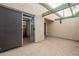 View of a private patio with sliding glass doors leading to the interior at 524 S Allred Dr, Tempe, AZ 85288