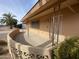 Side view of the home with a covered walkway and entrance at 5702 E Casper Rd, Mesa, AZ 85205