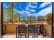 Private patio with seating area and city views at 7175 E Camelback Rd # 109, Scottsdale, AZ 85251