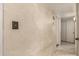 Hallway with doors to bedrooms and tiled floor at 8534 N 106Th Ln, Peoria, AZ 85345