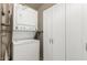 Stackable washer and dryer with additional storage at 8534 N 106Th Ln, Peoria, AZ 85345