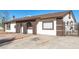 House exterior with gated entry and rock landscaping at 8840 W Desert Cove Ave, Peoria, AZ 85345