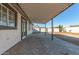 Covered patio with brick pavers and spacious backyard at 8840 W Desert Cove Ave, Peoria, AZ 85345