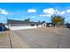 Ranch style home with front yard and driveway at 910 E 8Th Pl, Mesa, AZ 85203