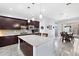 Modern kitchen with stainless steel appliances and an island at 10153 W El Cortez Pl, Peoria, AZ 85383