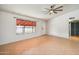 Living room featuring tile floors and large window at 1022 W Calle Tuberia --, Casa Grande, AZ 85194