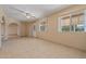 Living room with tile floors and ceiling fan at 10447 W Pleasant Valley Rd, Sun City, AZ 85351