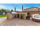 Outdoor kitchen with grill and beverage fridge at 2072 S Navajo Ct, Chandler, AZ 85286