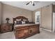 King-size bedroom with ensuite bathroom access at 245 E Smoke Tree Rd, Gilbert, AZ 85296