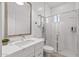 Clean bathroom features a walk-in shower, quartz countertop, and modern vanity at 24671 N 175Th Ave, Surprise, AZ 85387