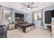 Bedroom with ceiling fan and window coverings at 26529 N 167Th Ave, Surprise, AZ 85387