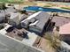 Single-story home with a landscaped yard, located near a pond and golf course at 30720 N Royal Oak Way, San Tan Valley, AZ 85143