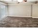Spacious living room featuring neutral walls and plush carpeting at 3434 W Danbury Dr # A212, Phoenix, AZ 85053
