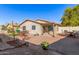 Large backyard patio, grassy area, and dining furniture at 42227 W Oakland Dr, Maricopa, AZ 85138