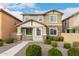 Two-story house with green exterior, stone accents, and landscaped front yard at 4279 E Pony Ln, Gilbert, AZ 85295