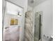 Bright bathroom with a large walk-in shower and tile flooring at 4319 E Vaughn Ave, Gilbert, AZ 85234
