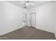 Bedroom with double door closet and carpet flooring at 4319 E Vaughn Ave, Gilbert, AZ 85234