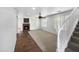Bright living room featuring a fireplace and staircase at 4319 E Vaughn Ave, Gilbert, AZ 85234