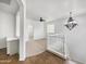 Upstairs loft area with wood flooring and chandelier at 4319 E Vaughn Ave, Gilbert, AZ 85234