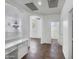 Open loft area with carpet flooring and chandelier at 4319 E Vaughn Ave, Gilbert, AZ 85234