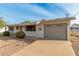 Ranch-style home with attached garage and a well-maintained front yard at 439 N 56Th St, Mesa, AZ 85205