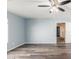 Large bedroom with wood-look floors and ceiling fan at 5240 W St Kateri Dr, Laveen, AZ 85339