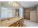 Bathroom features double sinks, granite countertops at 555 W Racine Loop, Casa Grande, AZ 85122
