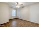 Spacious bedroom with tile floor and ceiling fan at 555 W Racine Loop, Casa Grande, AZ 85122