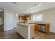 Eat-in kitchen with granite countertops and island at 555 W Racine Loop, Casa Grande, AZ 85122
