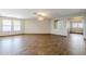 Bright and airy living area with tile floors at 555 W Racine Loop, Casa Grande, AZ 85122
