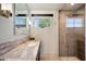 Bathroom with single vanity and walk-in shower at 5635 E Lincoln Dr # 13, Paradise Valley, AZ 85253