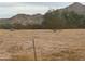 Large lot with mountain views and desert landscaping at 6512 N Loma Ct, Casa Grande, AZ 85194