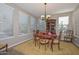 Bright dining room with hardwood floors and chandelier at 8680 W Quail Track Dr, Peoria, AZ 85383